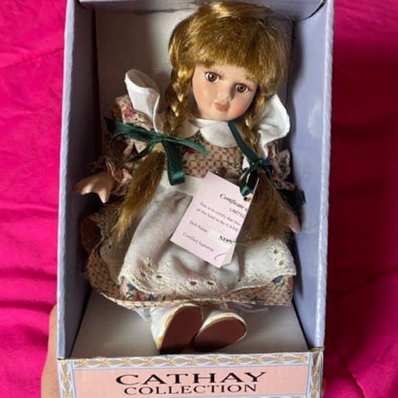 New in box Porcelain Bisque Doll: SONIA by CATHAY Doll Collection